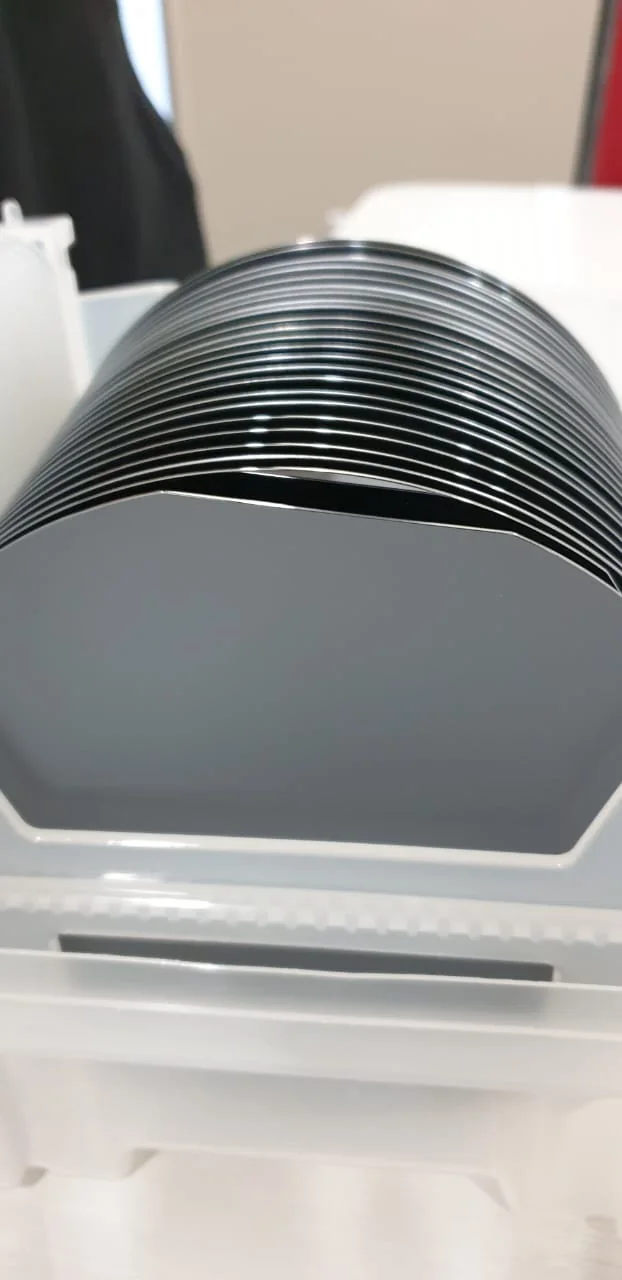 Silicon wafers held upright in a cassette